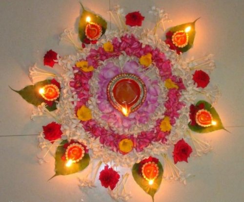 Diya And Flowers Rangoli Design