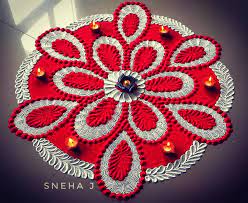 Pink And Yellow Colored Rangoli