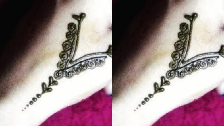 हार्ट और डॉट्स से बना खूबसूरत V लेटर मेंहदी डिजाइन