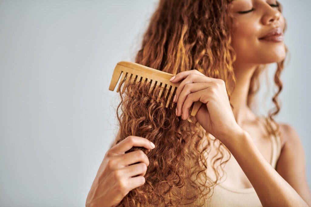 Detangle your hair properly with a wide-toothed comb